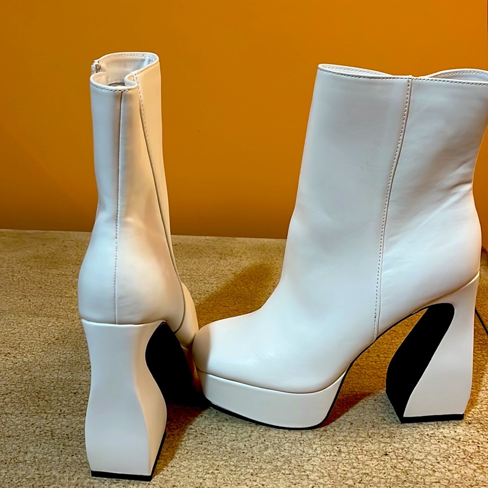 Winter white platform booties. Never worn!